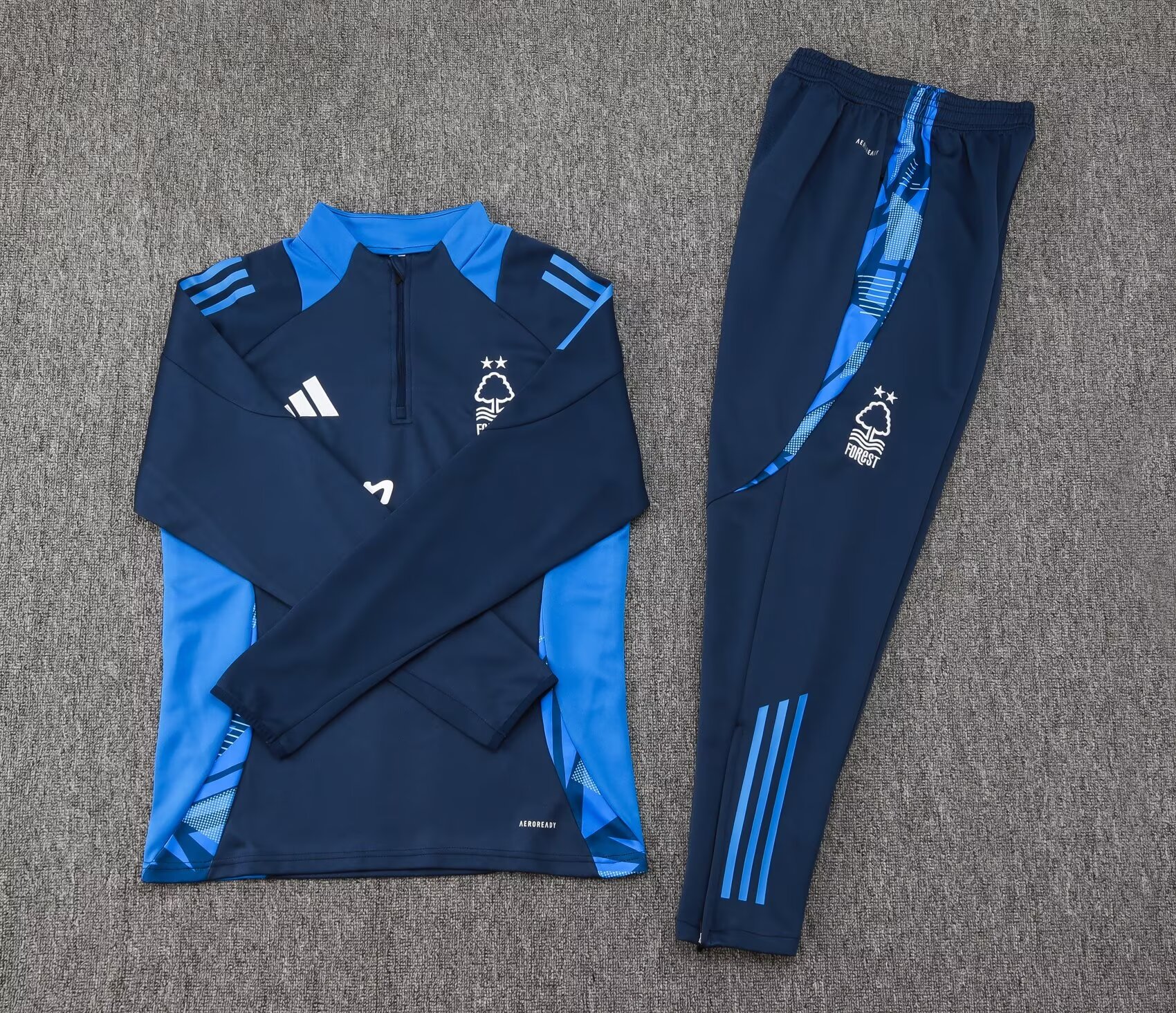 24/25 Nottingham Forest royal blue half zip tracksuit