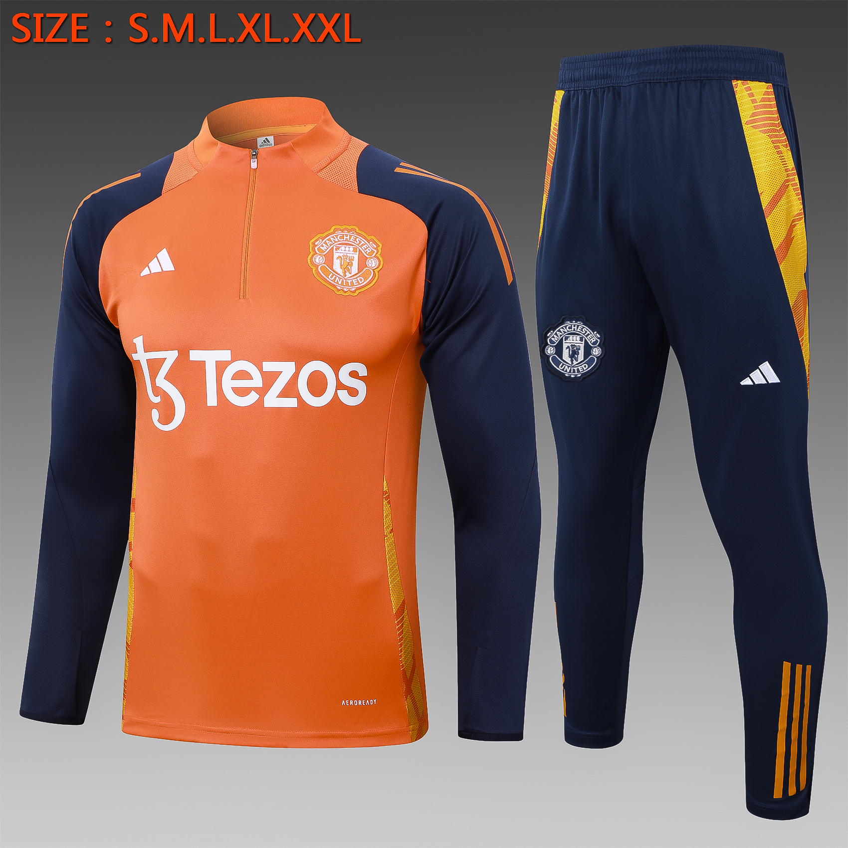 24/25 Manchester United orange half zip Tracksuit