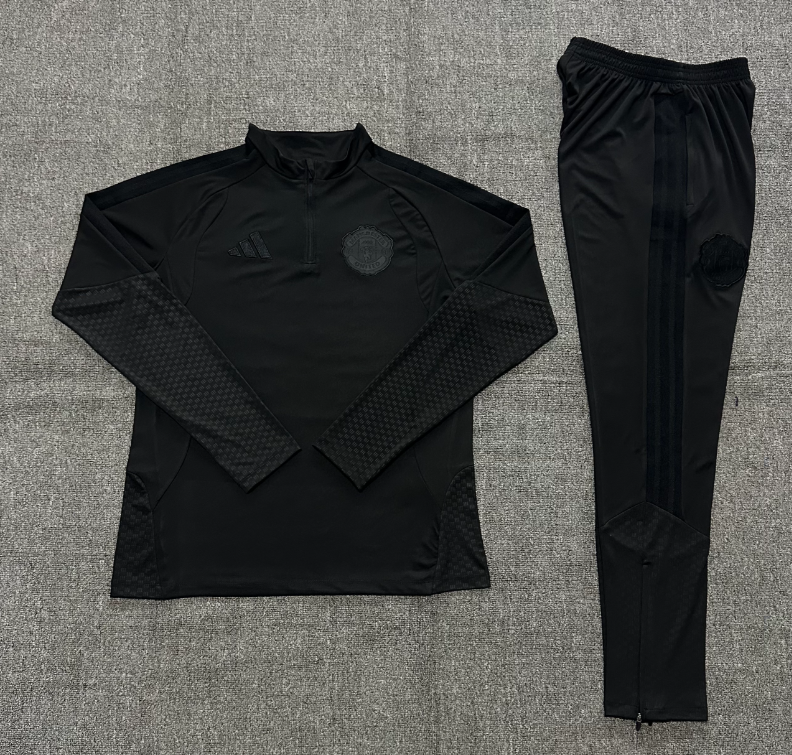 26/27 Adults Half Pull Manchester United Black [All Black] Tracksuit